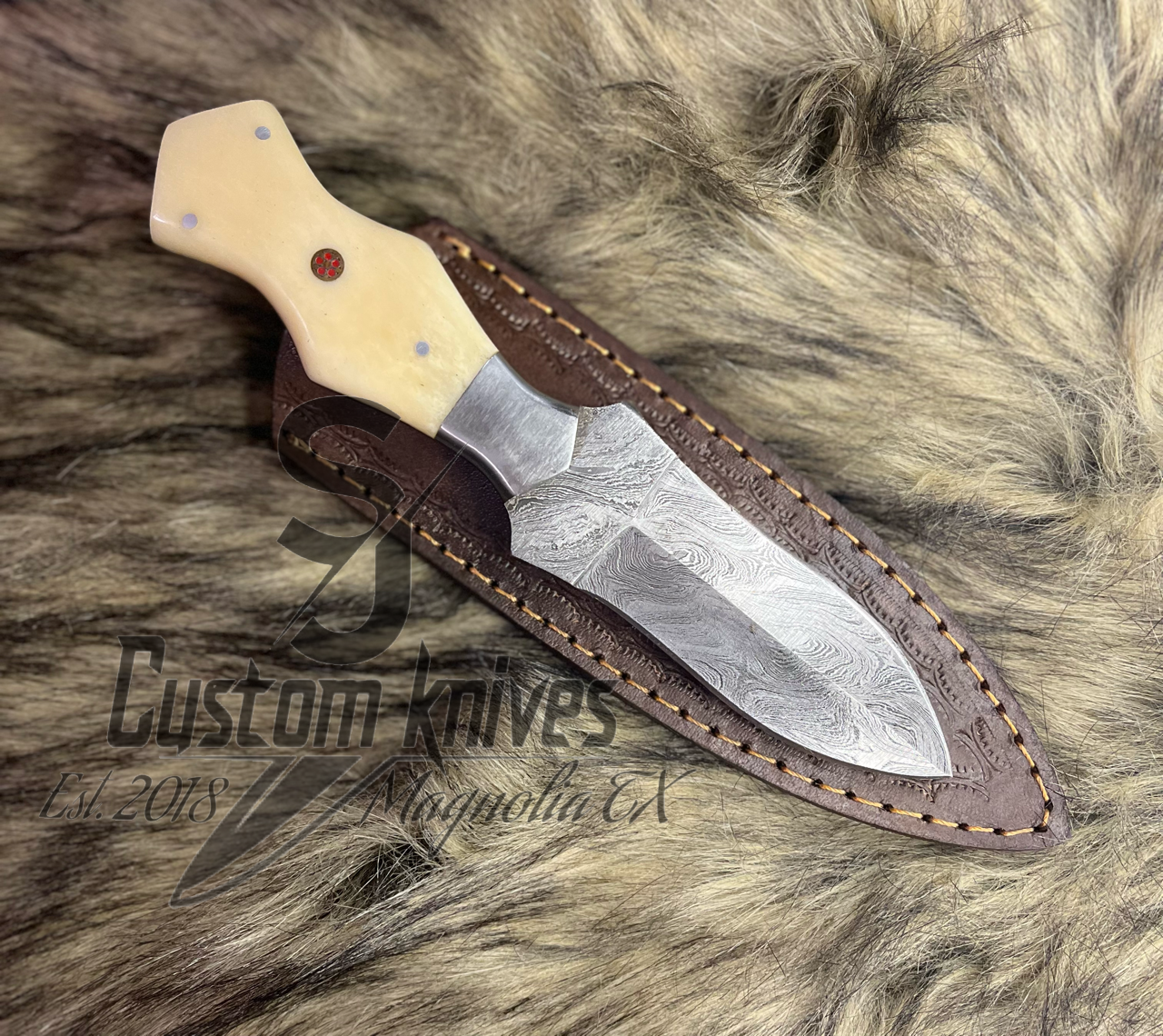 Damascus dual edge dagger- bone